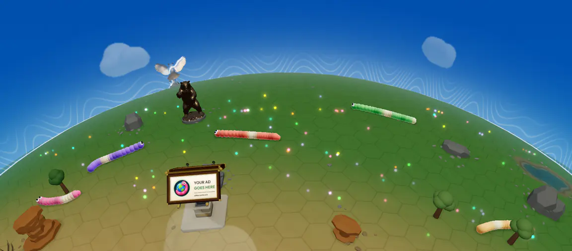 A small round planet under a blue sky, with green hexagon ground, trees, rocks, a lake, a bronze bear statue, a billboard and several colorful snakes